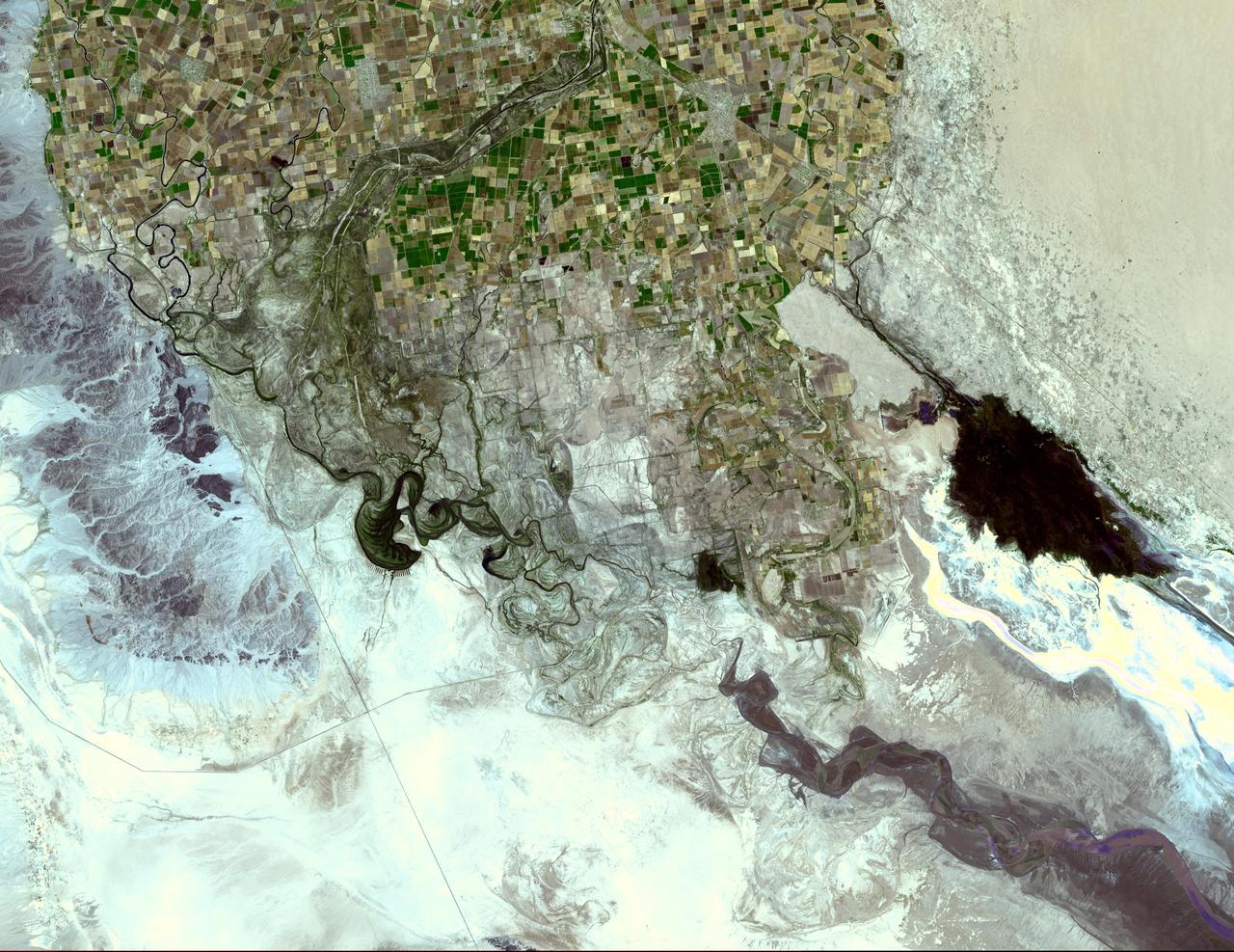 The Colorado River ends its 2330 km journey in the Gulf of Mexico in Baja California. NASA Terra spacecraft acquired this image on May 29, 2006.