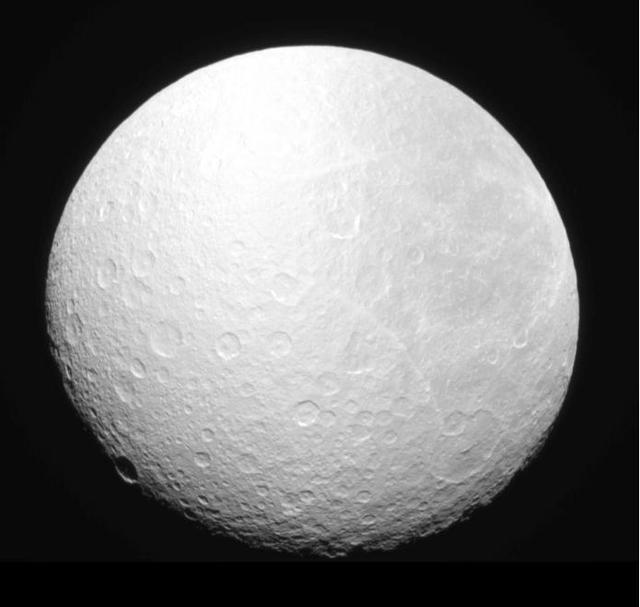 NASA image: Darkness Falls on Rhea