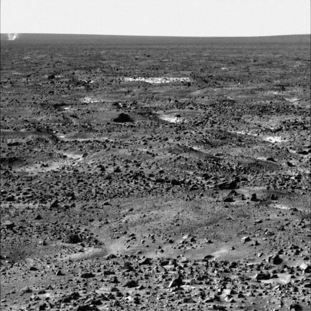 The Surface Stereo Imager on NASA Phoenix Mars Lander caught this dust devil in action west of the lander on Sol 104, or the 104th Martian day of the mission, Sept. 9, 2008.