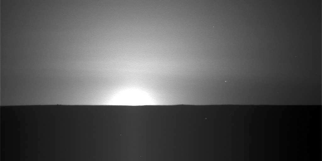This frame from a sequence of nine images taken by the Surface Stereo Imager on NASA Phoenix Mars Lander shows the sun rising on the morning of the lander 101st Martian day after landing.