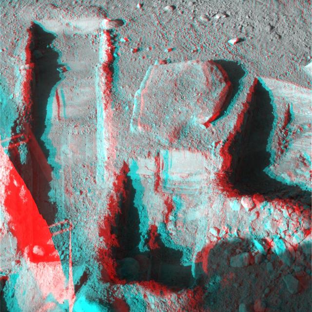The Surface Stereo Imager on NASA Phoenix Mars Lander took this anaglyph on Oct. 21, 2008; the trench on the upper left is called Upper Cupboard. 3D glasses are necessary to view this image.