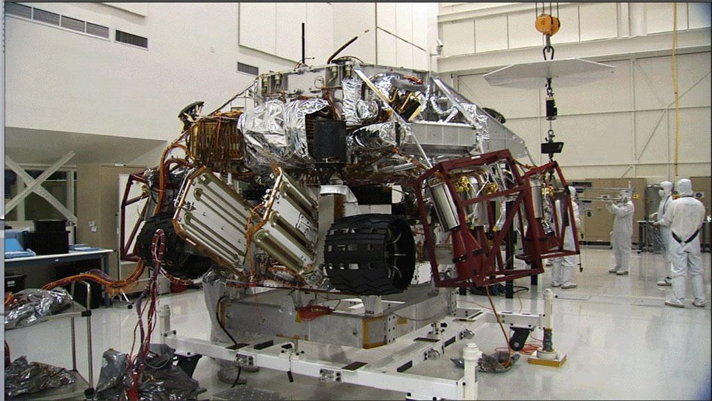These three images show the progression of tacking NASA Mars Science Laboratory rover and its descent stage in one of NASA Jet Propulsion Laboratory’s clean room. 