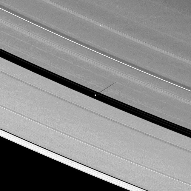 As Saturn equinox continues to approach, the moon Pan casts a slightly longer shadow on the A ring.