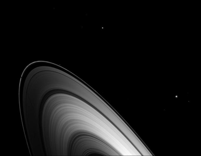 Just before Saturn August 2009 equinox, Dione joined other Saturnian moons in casting shadows on the planet main rings.