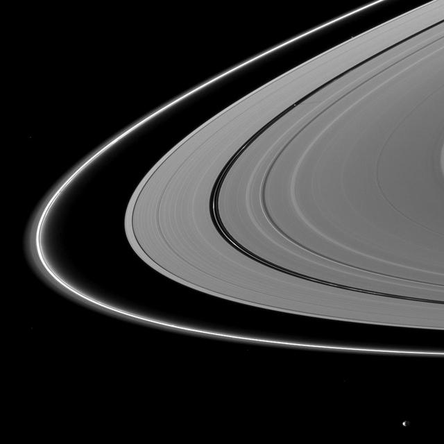 About a month after Saturn August 2009 equinox, shadows continue to grace the planet rings in this image taken by NASA Cassini Orbiter. Pan runs through the center of this image.