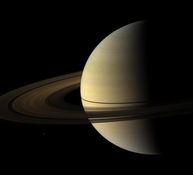 NASA Cassini Orbiter captured this natural color view of Saturn almost a month after the planet August 2009 equinox. The shadow cast on the planet by the rings remains narrow.