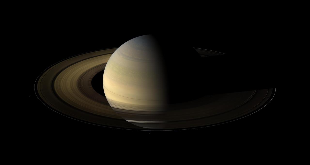 This Saturn equinox, captured here in a mosaic of light and dark, is the first witnessed up close by an emissary from Earth, none other than our NASA faithful robotic explorer, Cassini.