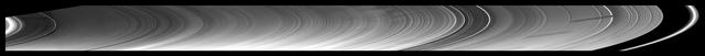 New insights into the nature of Saturn’s rings are revealed in this panoramic mosaic of 15 images taken during the planet’s August 2009 equinox, taken by NASA Cassini Orbiter.