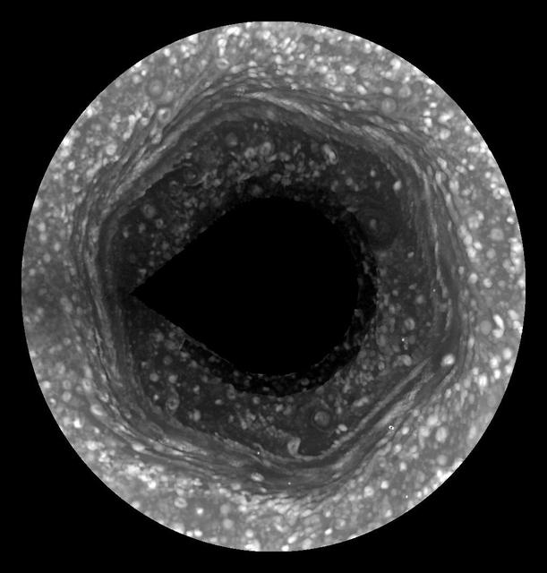 This image from NASA Cassini, made possible only as Saturn north pole emerged from winter darkness, shows new details of a jet stream that follows a hexagon-shaped path and has long puzzled scientists.