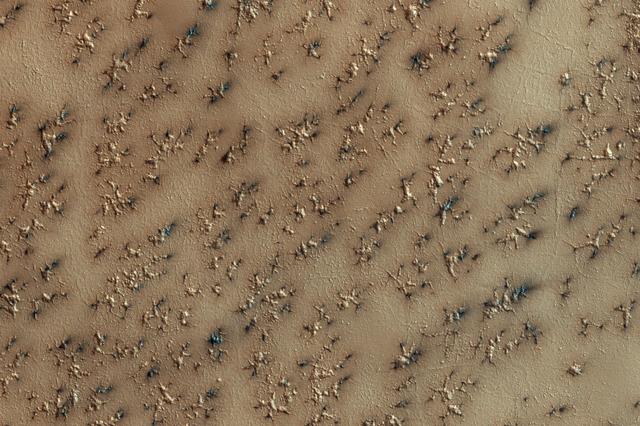 NASA image: How Gas Carves Channels