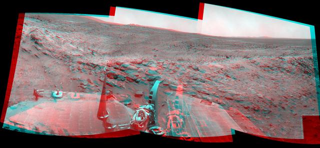 NASA Mars Exploration Rover Spirit used its navigation camera to take the images assembled into this stereo, 120-degree view southward after a short drive on February 3, 2009. 3D glasses are necessary to view this image.