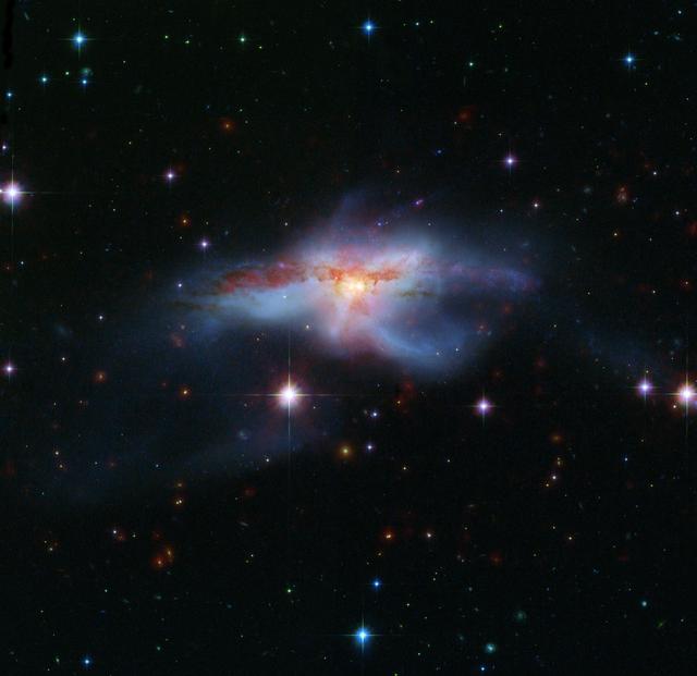 NASA image: Galaxies Collide to Create Hot, Huge Galaxy