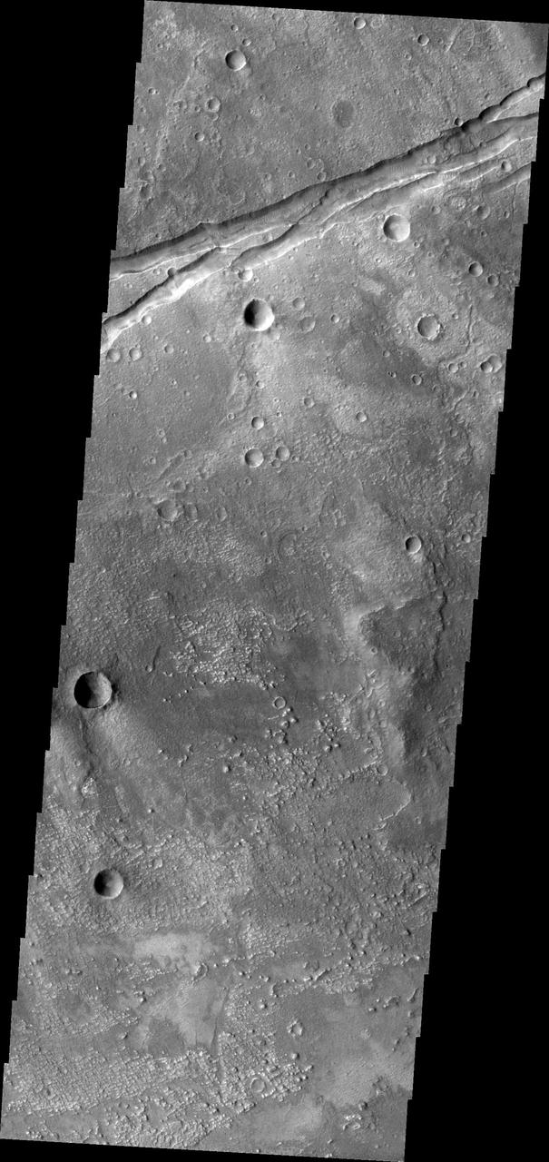 This 2001 Mars Odyssey THEMIS VIS image shows a portion of the eastern end of Sirenum Fossae.