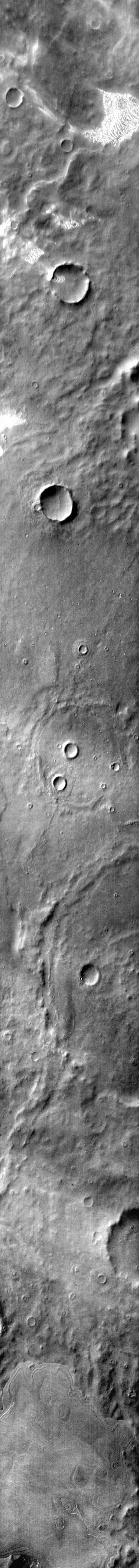 Several areas of dunes are located on the plains of Terra Cimmeria. The dunes appear bright in the daytime infrared due the warmer temperatures than the surrounding plains.