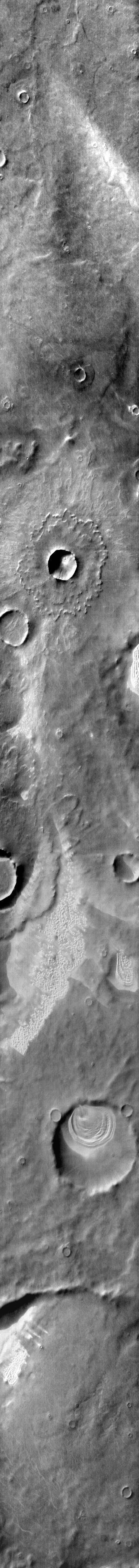 This 2001 Mars Odyssey daytime infrared image shows dunes found in craters and on the plains of Terra Cimmeria.