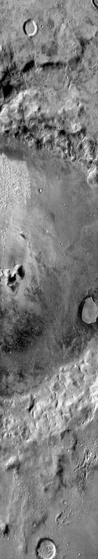 This 2001 Mars Odyssey image shows small individual dunes located on the floor of this unnamed crater in Noachis Terra.