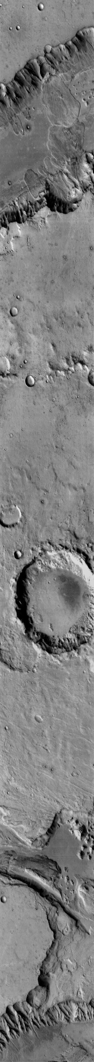 This 2001 Mars Odyssey image shows multiple landslides are visible in this daytime infrared image of  Capri Chasma.