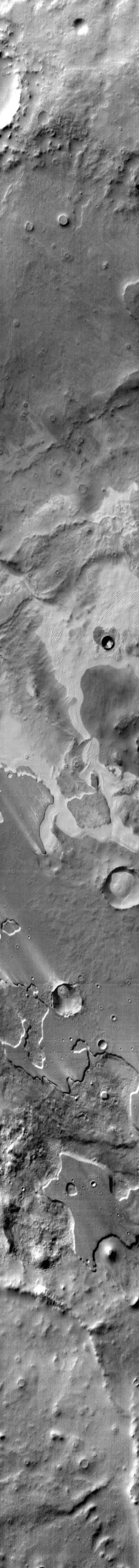 This Mars Odyssey image of Pityusa Patera shows sandy material trapped in depressions and blown into dune forms.