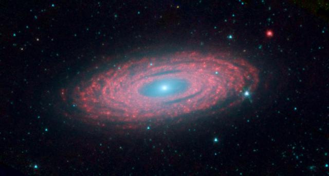 This image from NASA's Spitzer Space Telescope shows the spiral galaxy NGC 2841, located about 46 million light-years from Earth in the constellation Ursa Major. The galaxy is helping astronomers solve one of the oldest puzzles in astronomy: Why do galaxies look so smooth, with stars sprinkled evenly throughout? An international team of astronomers has discovered that rivers of young stars flow from their hot, dense stellar nurseries, dispersing out to form large, smooth distributions. This image is a composite of three different wavelengths from Spitzer's infrared array camera. The shortest wavelengths are displayed inblue, and mostly show the older stars in NGC 2841, as well as foreground stars in our own Milky Way galaxy. The cooler areas are highlighted in red, and show the dusty, gaseous regions of the galaxy. Blue shows infrared light of 3.6 microns, green represents 4.5-micron light and red, 8.0-micron light. The contribution from starlight measured at 3.6 microns has been subtracted from the 8.0-micron data to enhance the visibility of the dust features.The shortest wavelengths are displayed inblue, and mostly show the older stars in NGC 2841, as well as foreground stars in our own Milky Way galaxy. http://photojournal.jpl.nasa.gov/catalog/PIA12001
