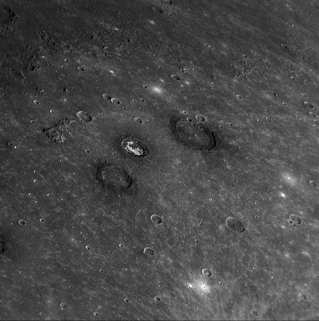 Sander, Munch, and Poe are a trio of impact craters within the Caloris impact basin. Munch and Poe were recently named, while Sander received its name in the first set of feature names after MESSENGER’s first Mercury flyby.