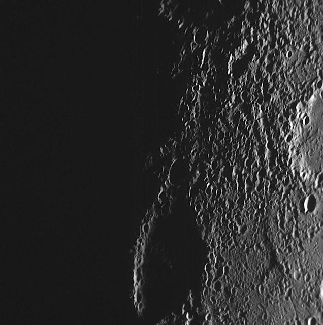 This high-resolution NAC image shows a view of Mercury dawn terminator, the division between the sunlit dayside and dark nightside of the planet, as seen as the MESSENGER spacecraft departed the planet during the mission second Mercury flyby.