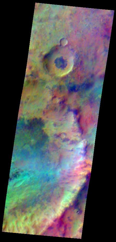 Pastel colors swirl across Mars, revealing differences in the composition and nature of the surface in this false-color infrared image taken on May 22, 2009,by the Thermal Emission Imaging System THEMIS camera on NASA Mars Odyssey orbiter.