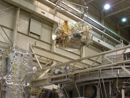Loading the Lunar Reconnaissance Orbiter into the thermal vacuum chamber at Goddard Space Flight Center. Diviner is one of seven instruments aboard NASA LRO Mission.