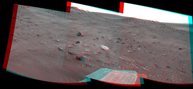 This stereo scene combines frames taken by the navigation camera on NASA Mars Exploration Rover Spirit during the 1,866th Martian day, or sol, of Spirit mission on Mars April 3, 2009. You will need 3-D glasses to view this image.