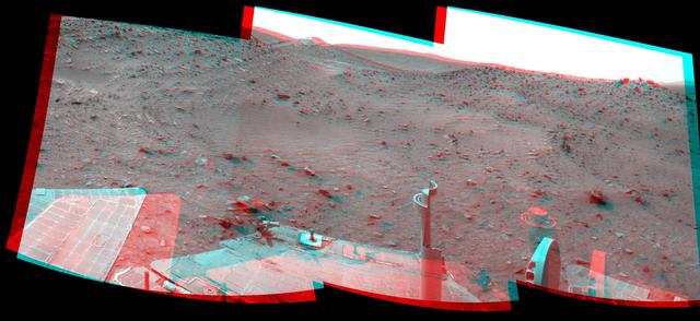 This stereo scene combines frames taken by the navigation camera on NASA Mars Exploration Rover Spirit during the 1,869th Martian day, or sol, of Spirit mission on Mars April 6, 2009. You will need 3-D glasses to view this image.