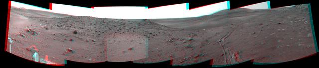 This stereo scene combines frames taken by the navigation camera on NASA Mars Exploration Rover Spirit during the 1,891st Martian day, or sol, of Spirit mission on Mars April 28, 2009. You will need 3-D glasses to view this image.