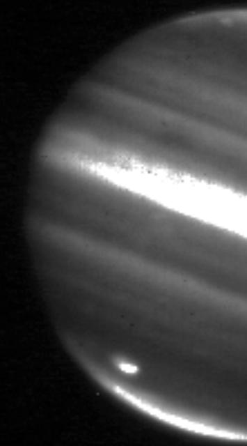 This image shows a large impact shown on the bottom left on Jupiter south polar region captured on July 20, 2009, by NASA Infrared Telescope Facility in Mauna Kea, Hawaii.