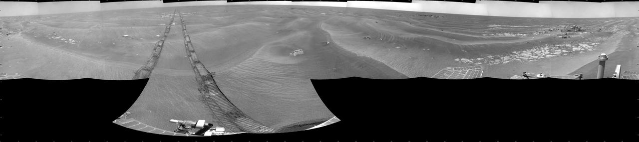 NASA Mars Exploration Rover Opportunity used its navigation camera to take the images combined into this 360-degree cylindrical view of the rover surroundings on the 1,950th Martian day, or sol, of its surface mission July 19, 2009.