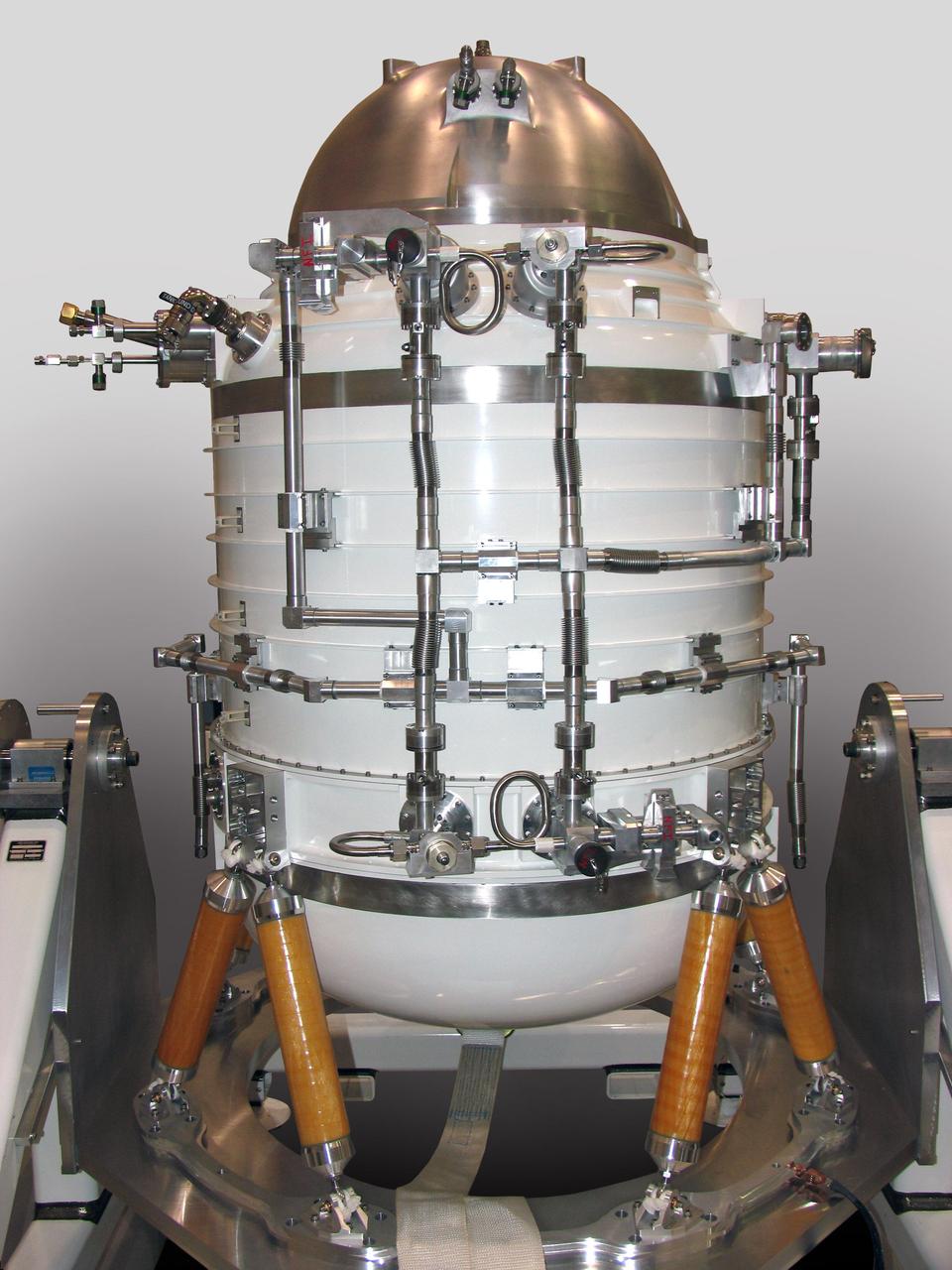 Some say the science instrument on NASA Wide-field Infrared Survey Explorer mission resembles the Star Wars robot R2-D2. The instrument is enclosed in a solid-hydrogen cryostat, which cools the WISE telescope and detectors.