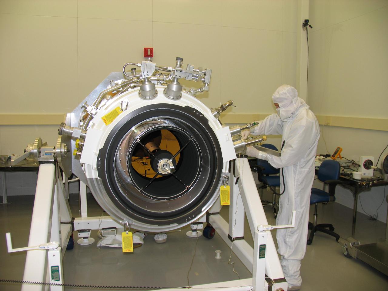 The science instrument on NASA Wide-field Infrared Survey Explorer is shown here with its aperture cover removed, during assembly at the Space Dynamics Laboratory in Logan, Utah.