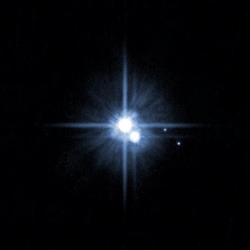 A pair of small moons photographed by NASA Hubble Space Telescope discovered orbiting Pluto in 2005 now have official names: Nix and Hydra.