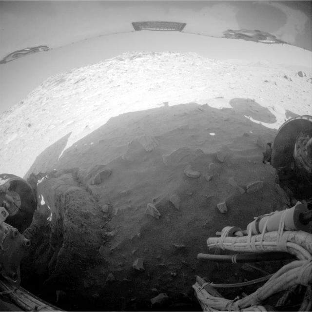NASA Mars Exploration Rover Spirit recorded this fisheye view after completing a drive during on Mars on Feb. 8, 2010. The drive left Spirit in the position where the rover will stay parked during the upcoming Mars southern-hemisphere winter.