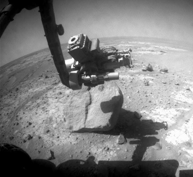 NASA Mars Exploration Rover Opportunity used the wire brush of its rock abrasion tool to scour dust from a circular target area on a rock called Marquette Island.