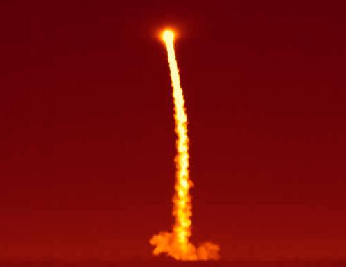 This infrared image shows NASA Wide-field Infrared Survey Explorer WISE rocketing into the sky just before dawn on Dec. 14 from Vandenberg Air Force Base in California. All systems are behaving as expected.