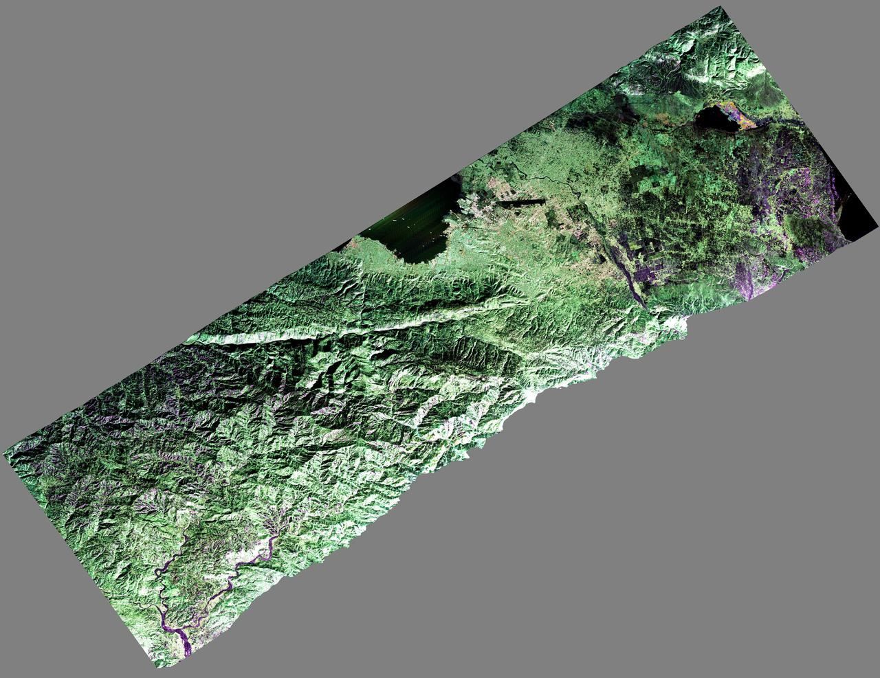 NASA Uninhabited Aerial Vehicle Synthetic Aperture Radar UAVSAR captured this false-color composite image of the city of Port-au-Prince, Haiti, and the surrounding region on Jan. 27, 2010.