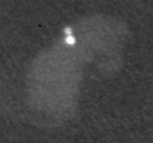 This image from NASA Cassini spacecraft, the first of its kind, shows lightning on Saturn night side flashing in a cloud that is illuminated by light from Saturn rings.