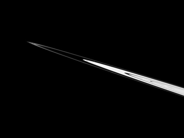 Atlas can be seen just above the center of this NASA Cassini spacecraft image as the moon orbits in the Roche Division between Saturn A ring and thin F ring.