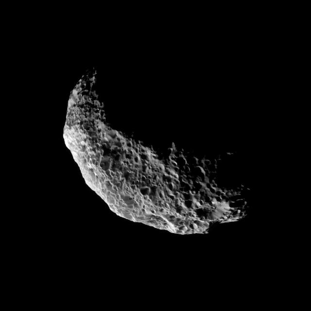 NASA Cassini spacecraft captures a view of the southern latitudes of Saturn tumbling moon Hyperion. Lit terrain seen here is mostly in the southern hemisphere of Hyperion. The south pole of the moon is near the bottom of the illuminated terrain.