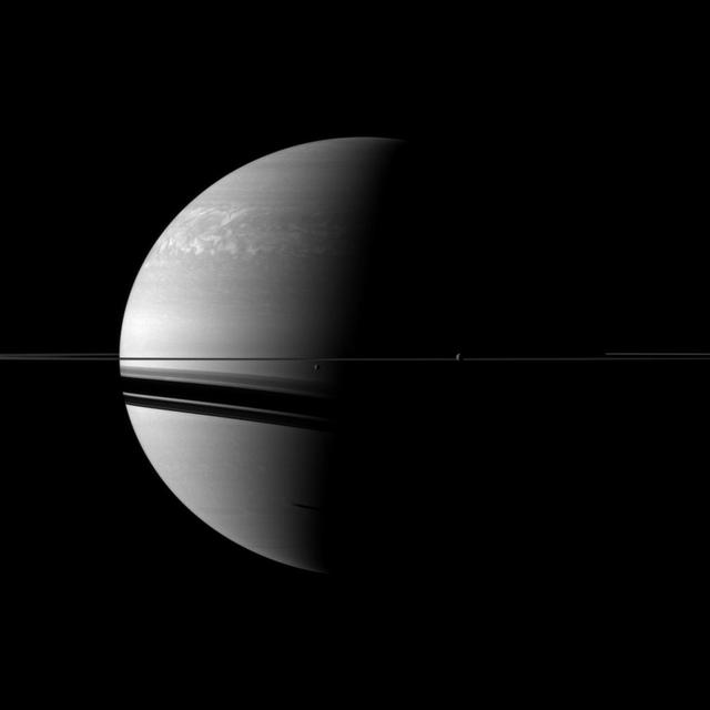 NASA image: Dwarfed by Gas Giant