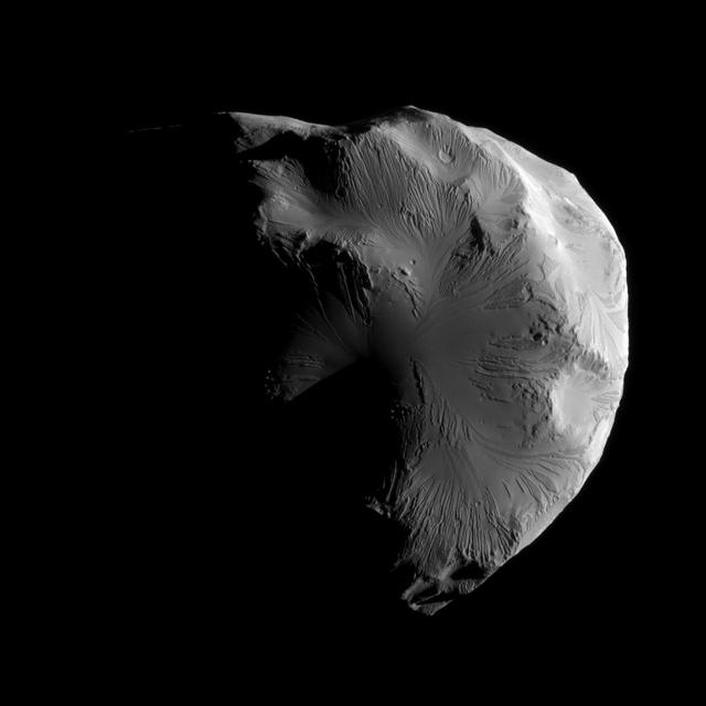 NASA Cassini spacecraft snapped this image of Saturn moon Helene while completing the mission second-closest encounter of the moon on June 18, 2011.