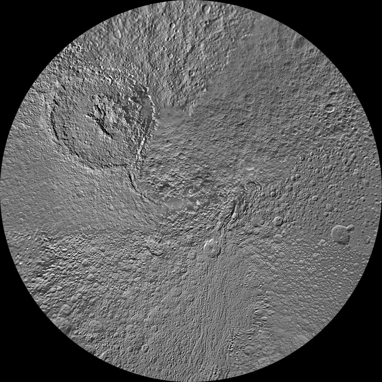 The northern hemisphere of Saturn moon Tethys is seen in this updated polar stereographic map, mosaicked from the best-available images obtained by NASA Cassini spacecraft.