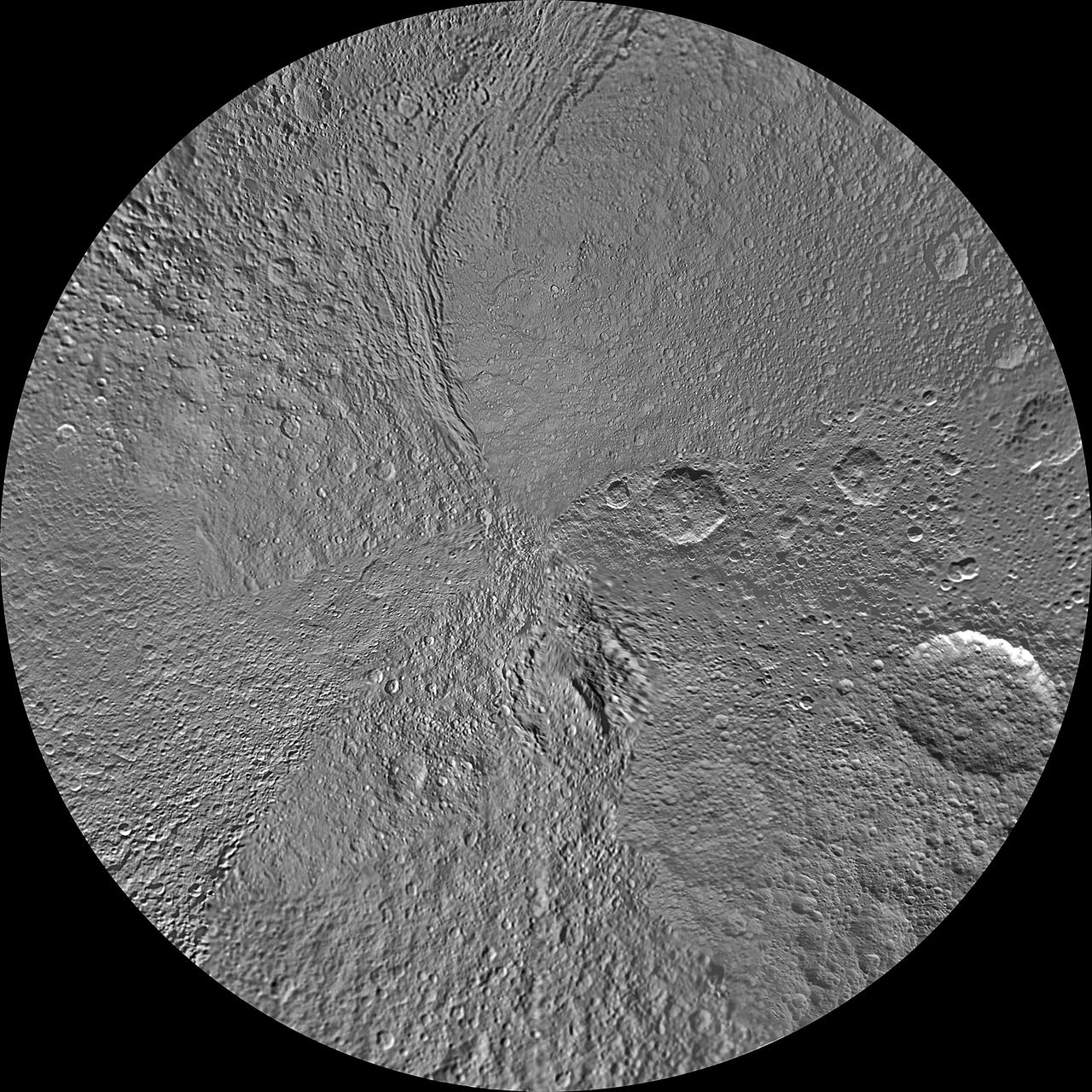 The southern hemisphere of Saturn moon Tethys is seen in this updated polar stereographic maps, mosaicked from the best-available images obtained by NASA Cassini spacecraft.
