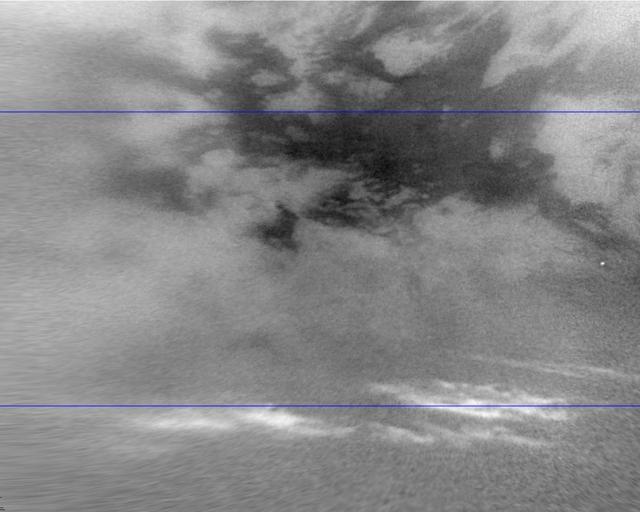 This image shows clouds in the mid-southern latitudes of Saturn largest moon, Titan, one of a series of images captured by NASA Cassini spacecraft a few months after fall began in the southern hemisphere.