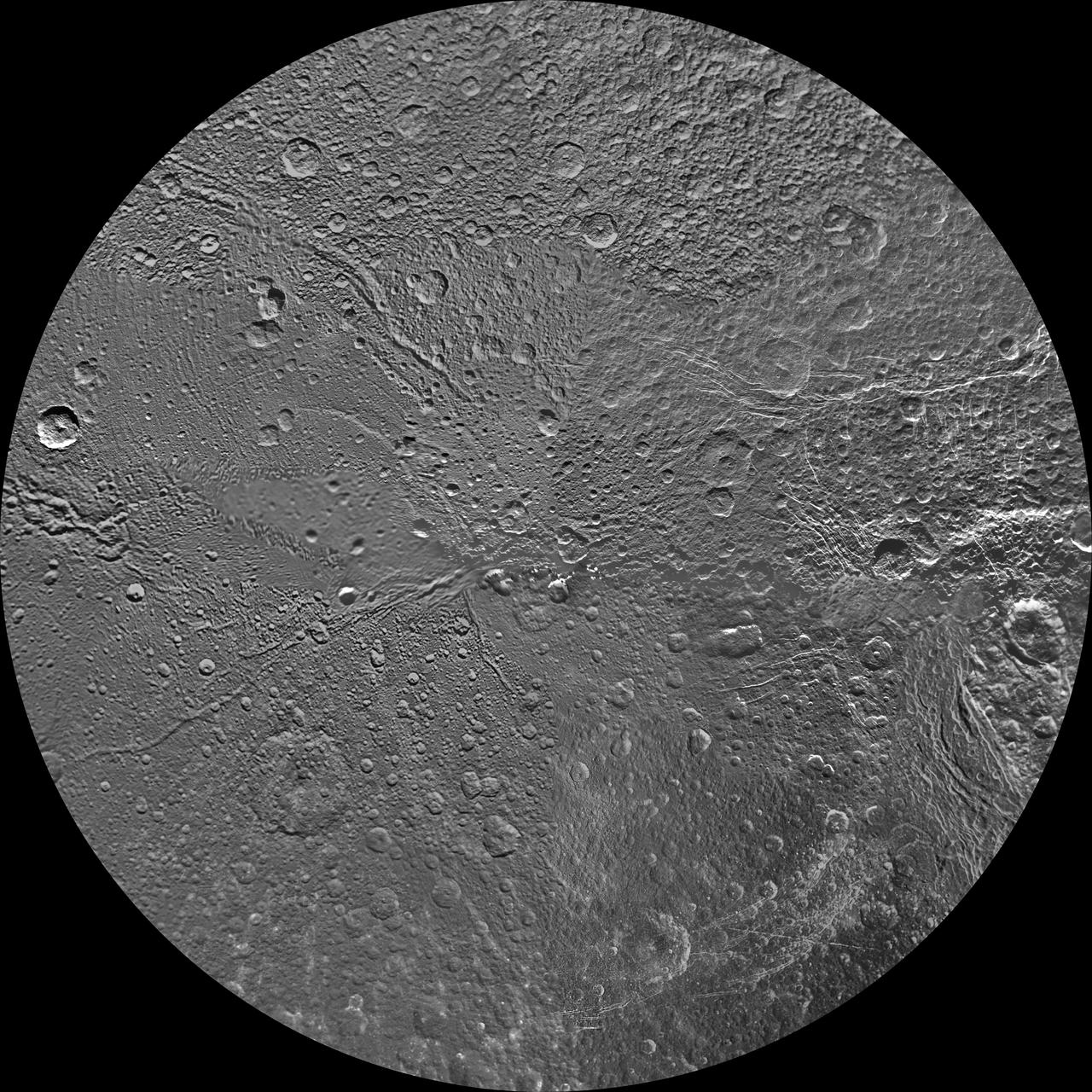 The northern and southern hemispheres of Dione are seen in these polar stereographic maps of the north pole, mosaicked from the best-available clear-filter images from NASA Cassini and Voyager missions.