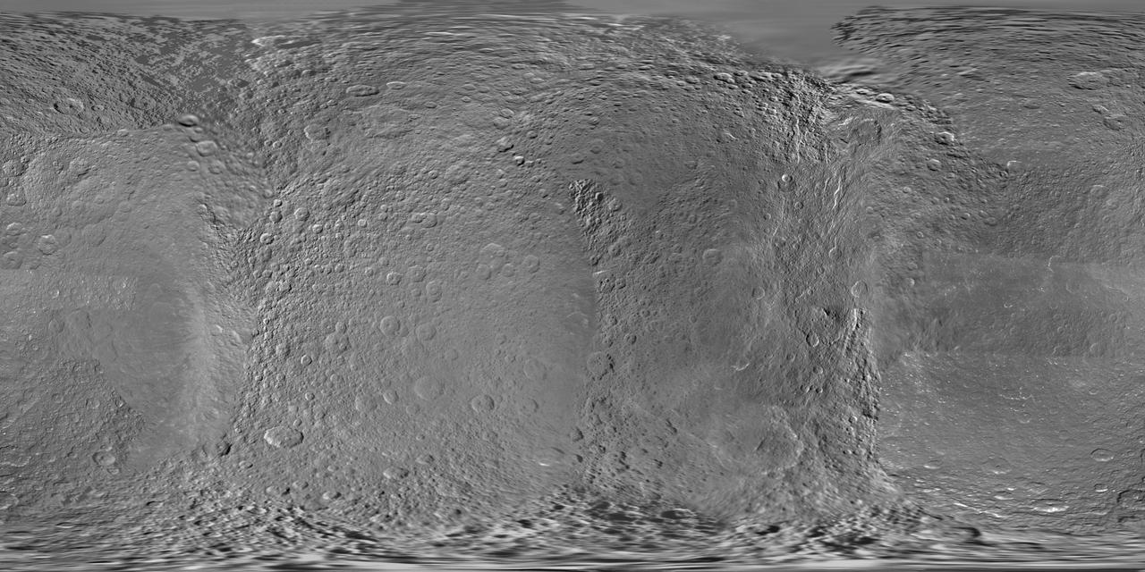 This global digital map of Rhea was created using data taken during NASA Cassini and Voyager spacecraft flybys. This map contains data from Cassini Jan. 11, 2011, flyby of Rhea. Six Voyager images fill gaps in Cassini coverage of the north pole.