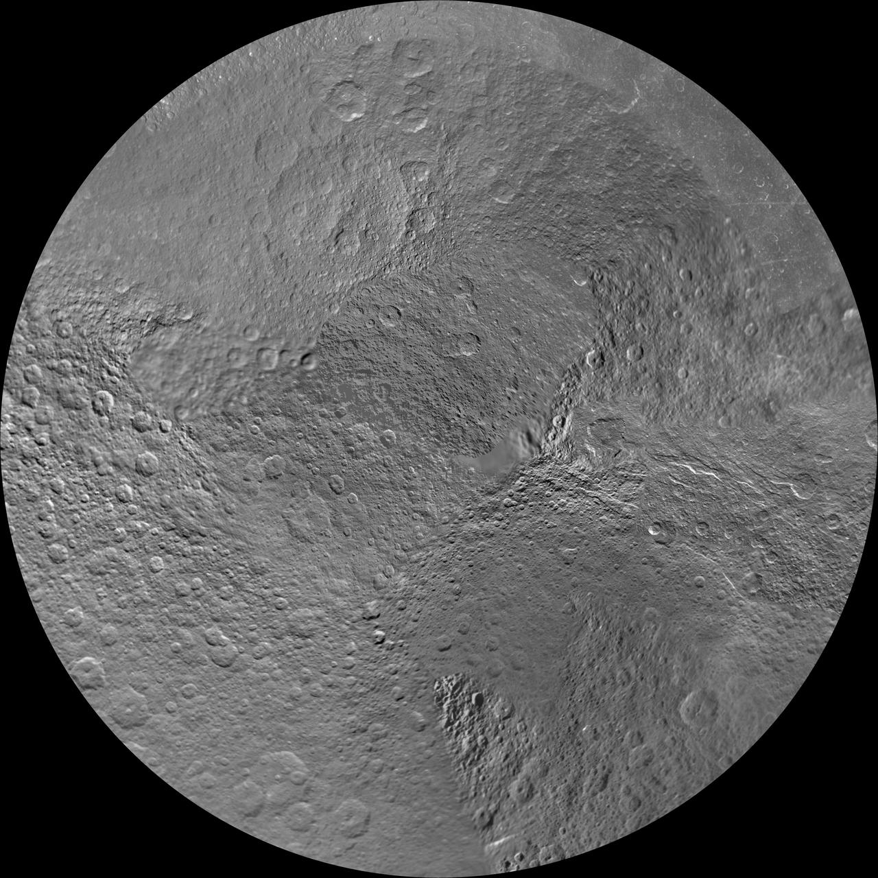 The northern and southern hemispheres of Rhea are seen in these polar stereographic maps, mosaicked from the best-available NASA Cassini and Voyager images. Six Voyager images fill in gaps in Cassini coverage of the moon north pole.